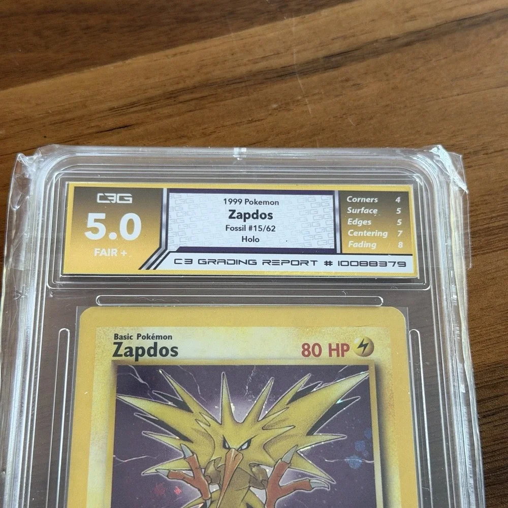 Pokemon TCG Zapdos 15/62 Fossil Holo Rare Unlimited 1999 English C3 Grading 5